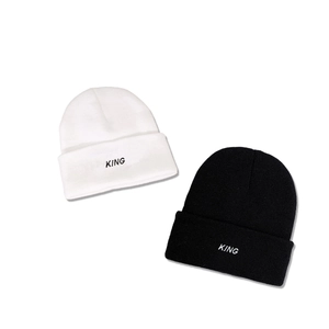 Fashionable knit beanies in black and white featuring 'KING' embroidery for winter warmth