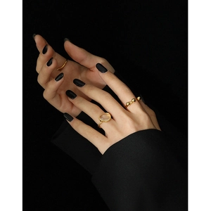 Elegant gold S925 sterling silver ring set with moonstone crystals on model hand