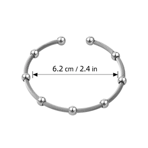 Detail shot showing the 6.2cm inner diameter of the silver beaded steel wire bangle