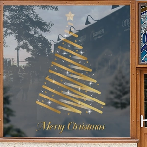 Elegant gold and silver Christmas tree window decal with Merry Christmas text on glass