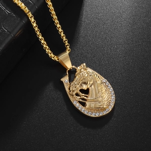 Gold hip hop necklace with iced-out horseshoe horse head pendant on box chain