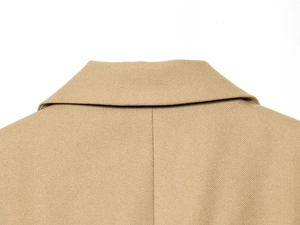 Detail of khaki blazer collar showing premium twill fabric texture and precise stitching