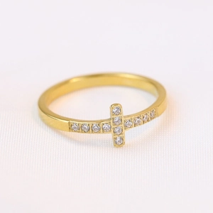 Detailed view of 7mm golden stainless steel ring featuring a zircon inlaid cross design