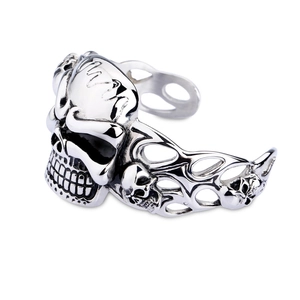 Vintage punk silver skull bangle with retro hollow flame design in polished stainless steel