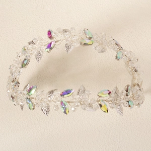 Detail of handmade baroque bridal headband with crystals, silver leaves and pearls