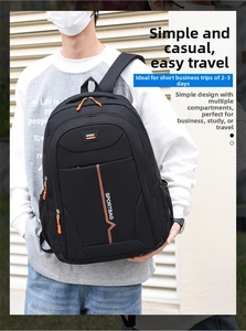 Detail showing the multi-layered zippers and orange accents of the black sport backpack