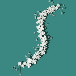 Elegant white flower and crystal bridal hair vine with silver wire for wedding hair styling