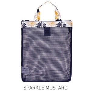 Mesh beach bag in navy blue with mustard yellow sparkle pattern handles for summer
