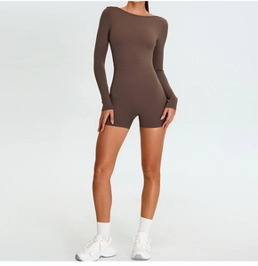 Close-up of a brown long sleeve yoga romper with high-stretch slim fit fabric texture