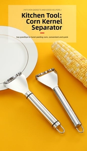 Close-up of stainless steel corn peeler with serrated blade and ergonomic handle hook