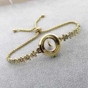 Elegant gold women's watch with diamond flower bracelet and adjustable drawstring