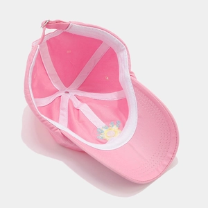 Pink baseball cap with inner sunflower embroidery and adjustable strap in six-panel design