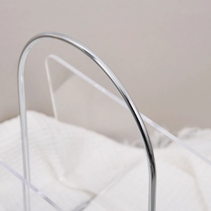 Modern acrylic and silver metal magazine rack for desktop or floor storage