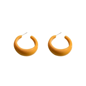 Minimalist yellow resin C-shaped hoop earrings with silver pins for a stylish look