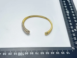 Detailed size measurement of a gold stainless steel open bangle with sparkling rhinestones