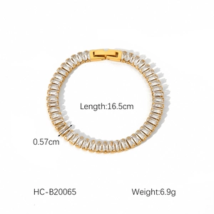 Detail view of gold zircon bracelet showing dimensions 16.5cm length and 0.57cm width