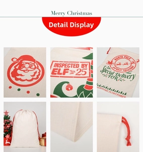 Detail view of canvas Christmas drawstring bag with festive print and sturdy red rope