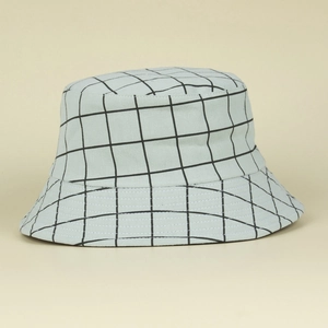 Detailed close-up showing light blue checkered cotton fabric of the bucket hat
