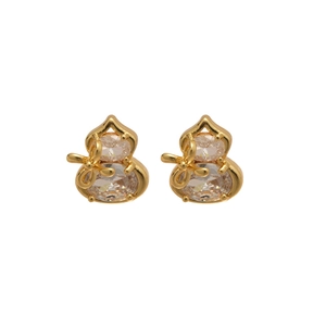 Gold plated gourd stud earrings with zircons and bow details on white background