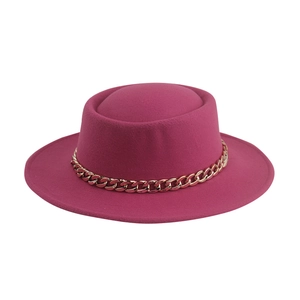 Classic rose red wool felt boater hat with a chunky gold chain band on white background