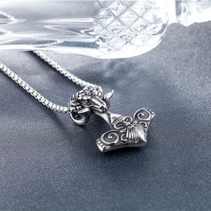 Vintage Mjölnir pendant necklace with ram head design in antique silver finish