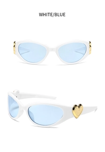 Detailed views of white heart sunglasses with blue lenses and gold heart metal accents