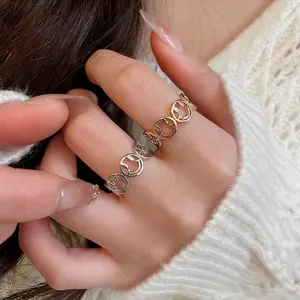 Sweet zircon bowknot open ring in gold and silver finish with hollow smiley face design