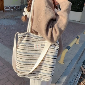 Large capacity striped canvas tote bag with shoulder strap and bozakka beauté logo