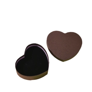 Deep brown heart-shaped jewelry gift box with black velvet lining and light purple trim