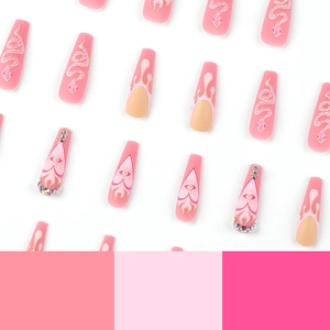Matte pink long coffin press-on nails with snake pattern and rhinestone accents
