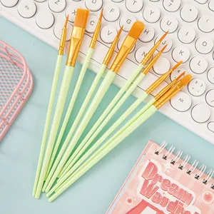 Detailed view of 10-piece mint green nylon brushes with flat and round tips