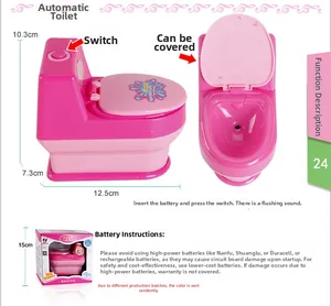 Detailed view of pink toy toilet with sound effects and openable lid dimensions