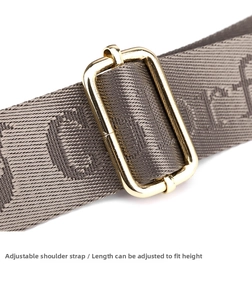 Close-up of adjustable woven shoulder strap with metallic buckle for crossbody bag