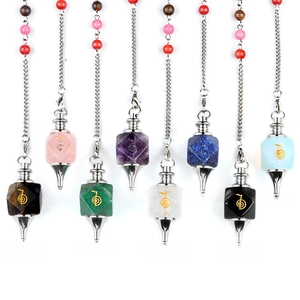 Set of eight chakra power symbol dowsing pendulums in natural crystal stones