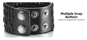 Macro detail of men's black woven leather bracelet showing adjustable metal snap closures