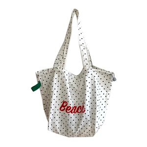 Japanese style white polka dot canvas tote bag with red Beach lettering print