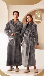 Detail of gray flannel bathrobe featuring diamond-stitched cuffs and plush shawl collar