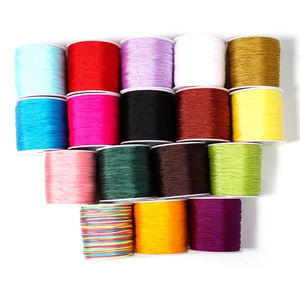 Spools of colorful 0.8mm nylon cord for DIY jewelry and braided hand rope making
