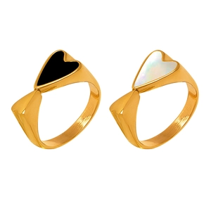 18k gold plated heart rings featuring white shell and black enamel inlay on white background