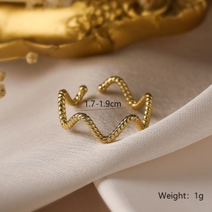 Macro view of gold wave twisted open ring showing 1.7-1.9cm inner diameter size