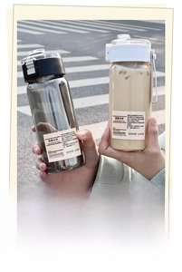 Detail of portable plastic sports water bottles with flip-top lids and tea filters