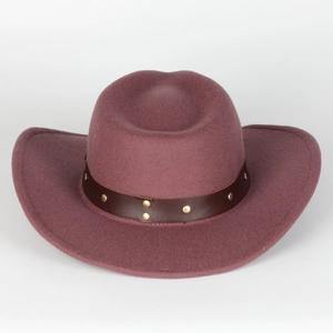 Detail of dark wine red wool fedora hat with brown leather band and gold metal studs
