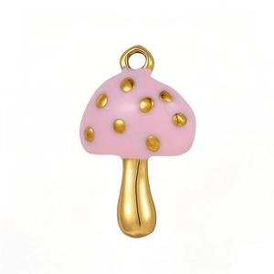 Pink enamel mushroom pendant with gold spots and metal hanging loop for DIY jewelry