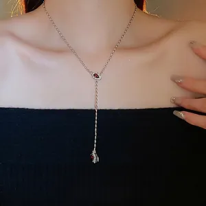 Elegant Y-shaped necklace with silver bead chain and two marquise red gemstones
