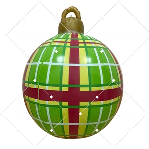 Detailed view of an inflatable PVC Christmas ball with green and red plaid pattern