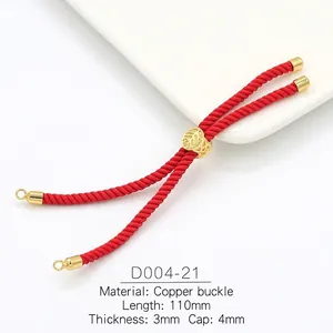 Macro shot of 3mm red braided cord with 18k gold plated tree leaf sliding bead and end caps