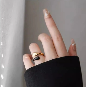Minimalist gold and black teardrop open ring in stainless steel with 18k gold plating