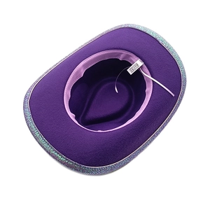 Detailed top view of purple felt cowboy hat with glitter lace trim and inner sweatband