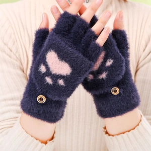 Detail of navy blue plush fingerless gloves featuring a cute pink cat paw embroidery design