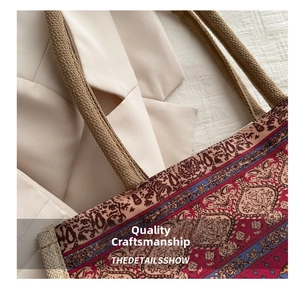 Detail showing high-quality linen texture and ethnic woven pattern on the tote bag
